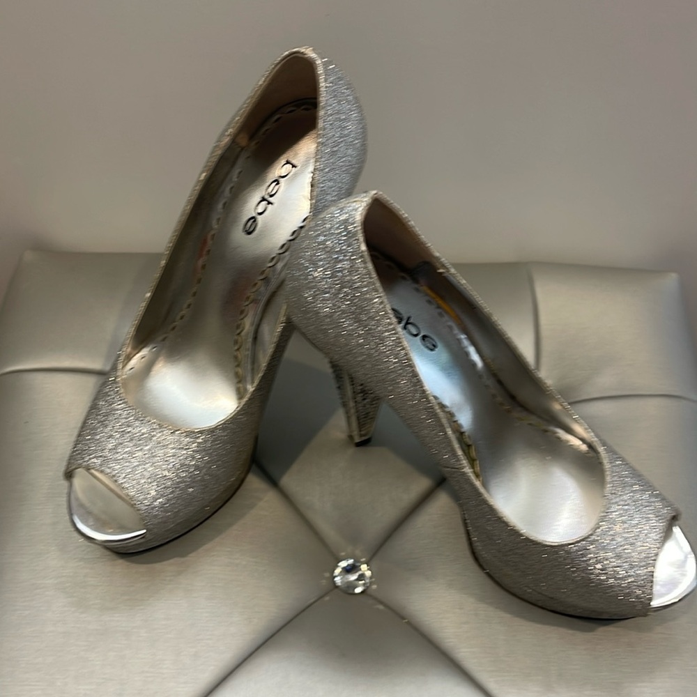 Look elegant in these BB platforms with rhinestone heels size 7
